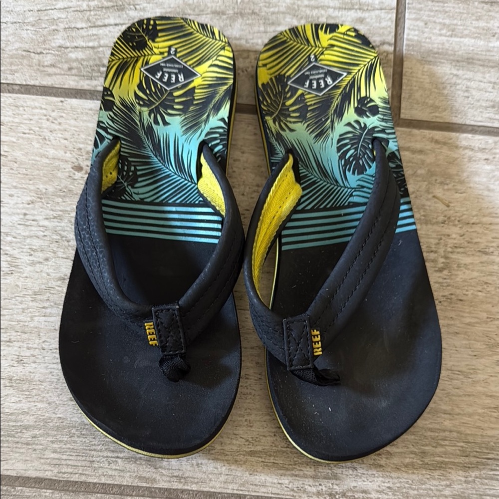 Reef Tropical Black and Yellow Sandals